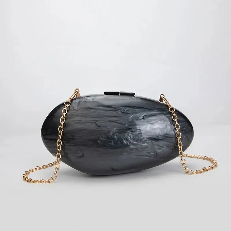 Pearlescent Shell-Shaped Clutch for Weddings and Parties