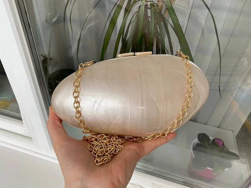 Pearlescent Shell-Shaped Clutch for Weddings and Parties