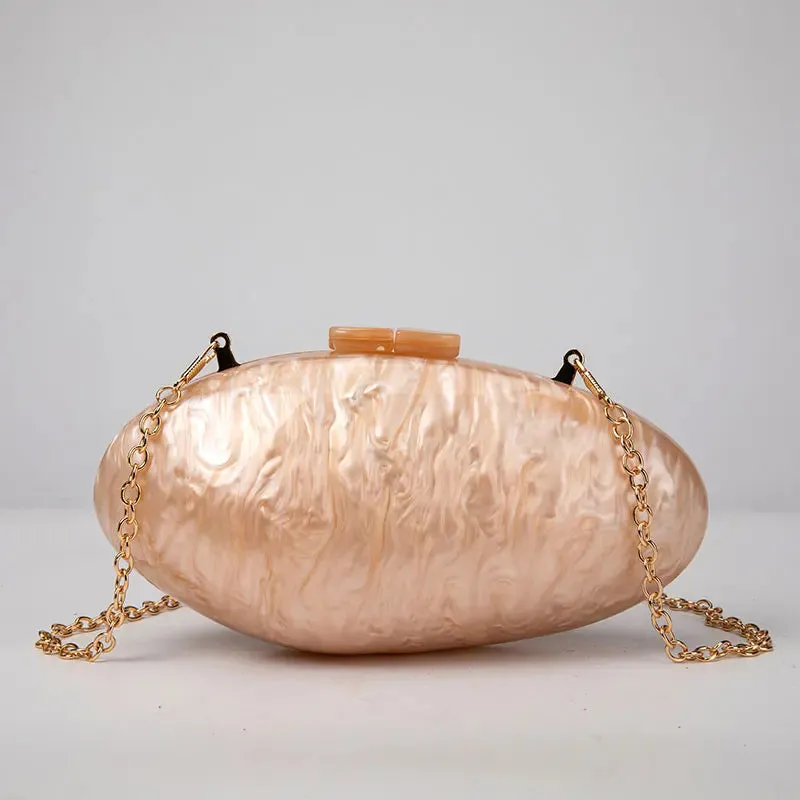 Pearlescent Shell-Shaped Clutch for Weddings and Parties