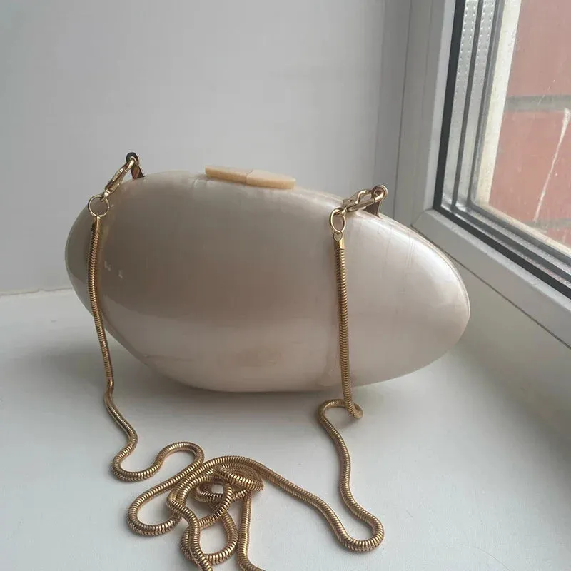Pearlescent Shell-Shaped Clutch for Weddings and Parties