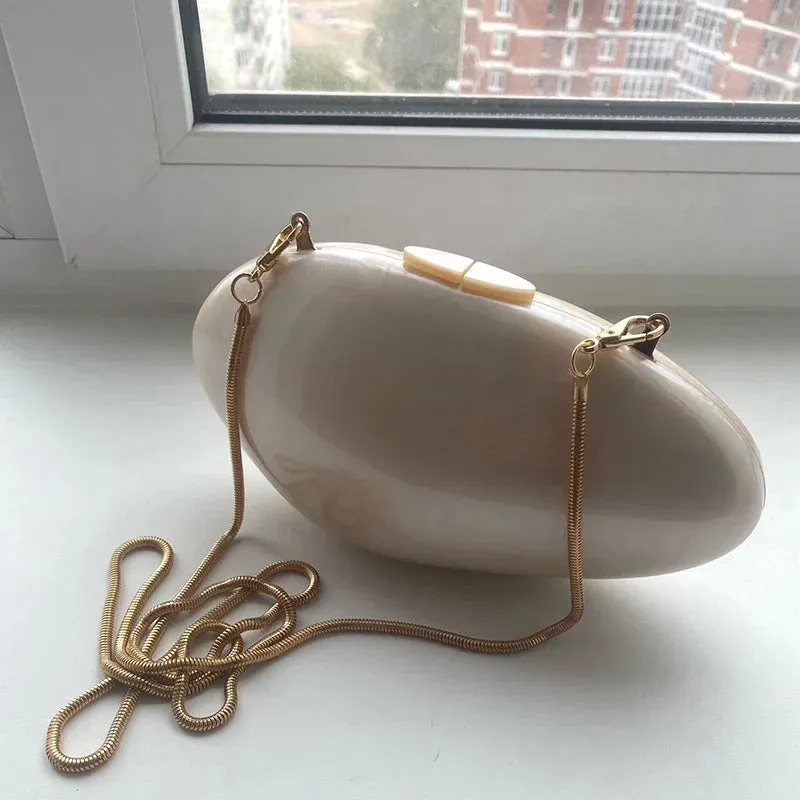 Pearlescent Shell-Shaped Clutch for Weddings and Parties